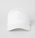 Gorra trucker District — Alo