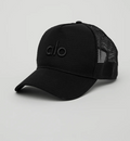 Gorra trucker District — Alo