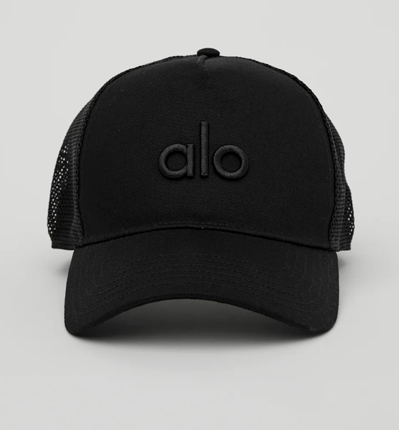 Gorra trucker District — Alo